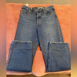 Levi’s rib cage straight button fly jeans